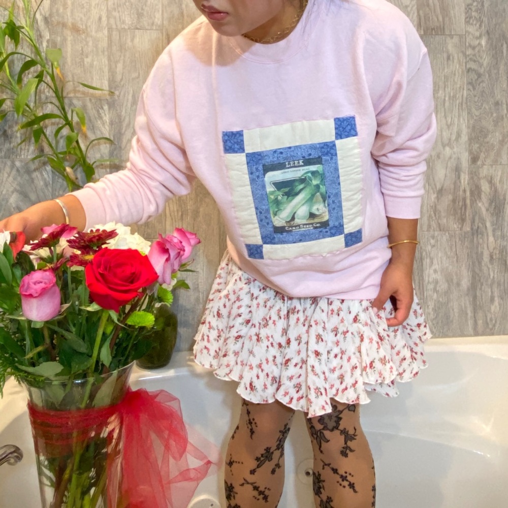 Up-cycled sweatshirt with vintage quilt